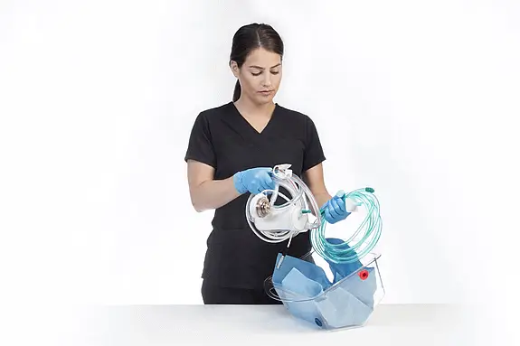 Woman unpacking Priming tray