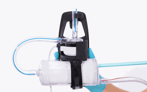 LifeSPARC Pump in Holster held by a Gloved Hand