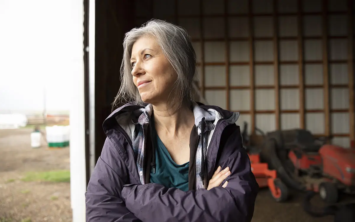 Woman looking out window