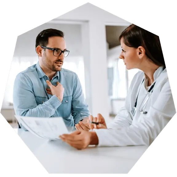 Doctor talking to a patient about VNS Therapy™