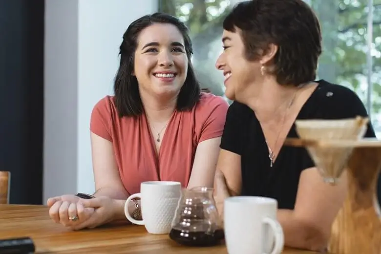 mum and daughter enjoying coffee