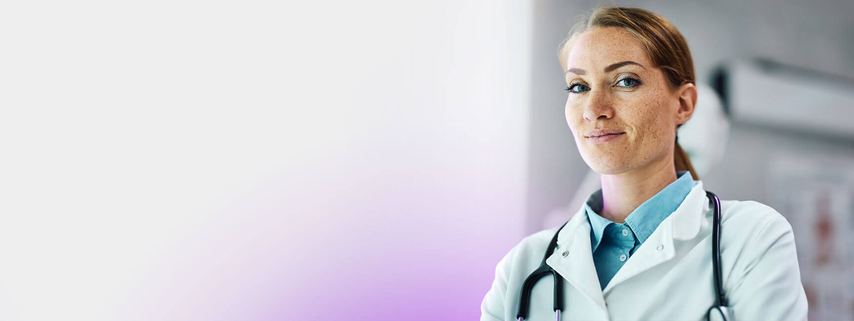 A woman doctor gazing out