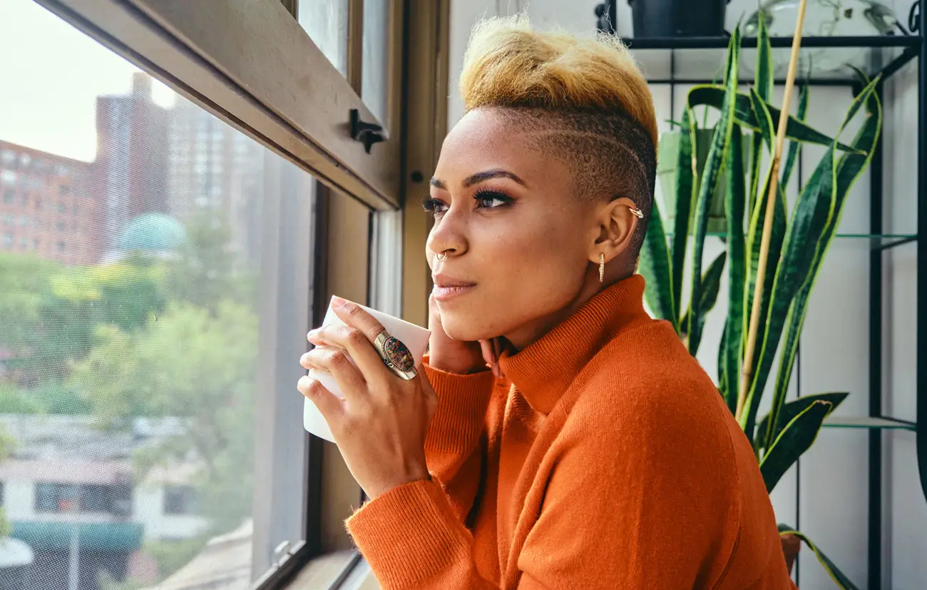 Woman on Railing smiling