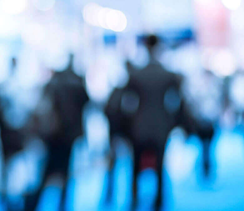 abstract image of people at a conference