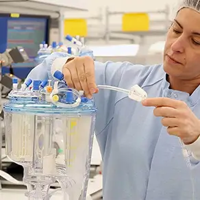 employee working on an oxygenator